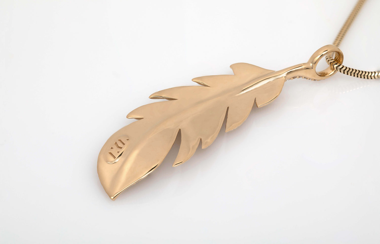 Solid gold Feather pendant